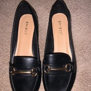 Black Loafers with gold embellishment